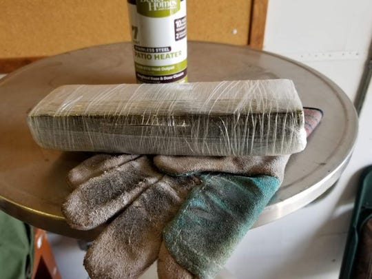 Officials say a bundle of marijuana was dropped into a Big Brothers Big Sisters donation bin in Springfield last year.