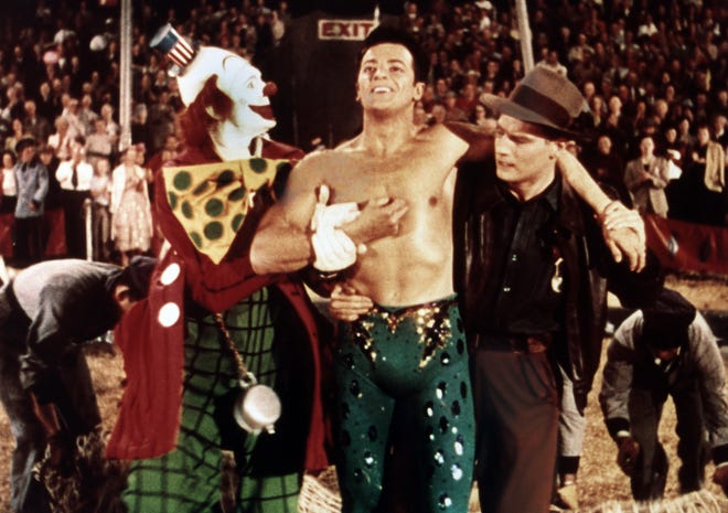 James Stewart (left), Cornel Wilde and Charlton Heston star under the big top in "The Greatest Show on Earth."