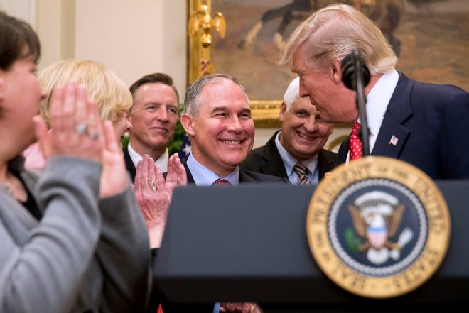 President Donald Trump, here in 2017 with former Environmental Protection Agency administrator Scott Pruitt, signed an order two years ago directing the EPA to withdraw from the Waters of the United States rule, which expanded the number of waterways protected under the Clean Water Act.