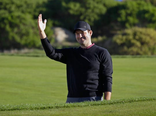 Tony Romo makes waves after hitting the ball out of a bunker and near the 11th green pin of the Monterey Peninsula Golf Course during the second round of the AT & T Pebble Beach Pro-Am National Golf Tournament , in Pebble Beach, California. "width =" 540 "data-mycapture-src =" "data-mycapture-sm-src ="