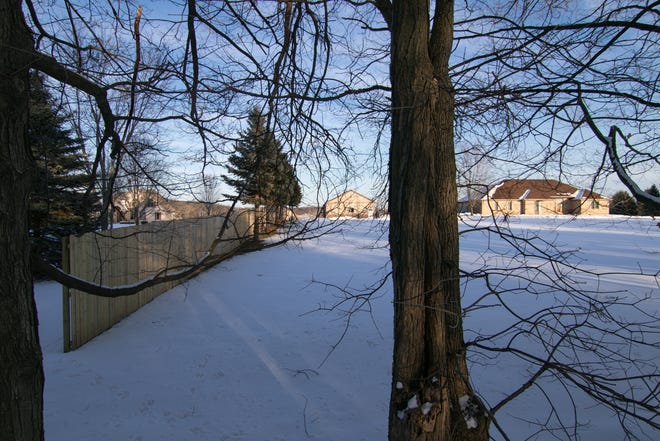 Two neighbors on Pingree Road in Marion Township, shown Tuesday, Feb. 19, 2019, have escalated a dispute.