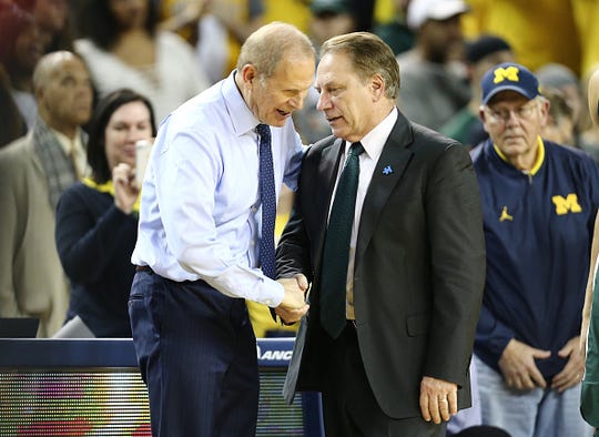 Michigan State coach Tom Izzo shakes hands with John Beilein of Michigan after the game in Ann Arbor in 2017.