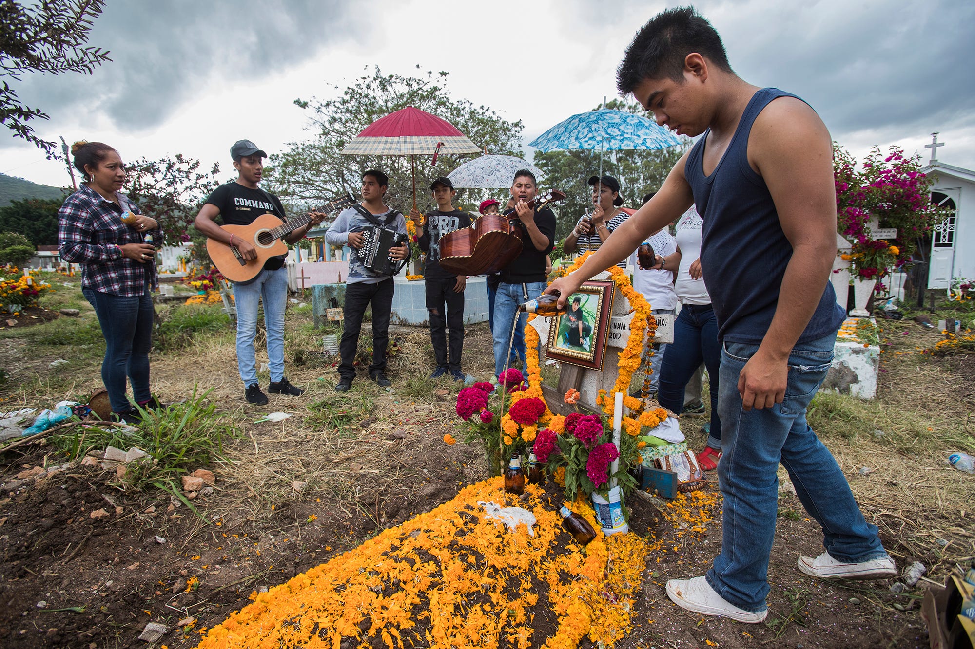 On Day of the Dead, families gather in the Chilapa cemetary to memorialize a young man killed by a cartel.