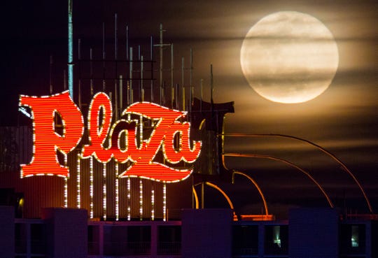 A super moon of snow rises Tuesday at the Plaza Hotel and Casino in downtown Las Vegas.