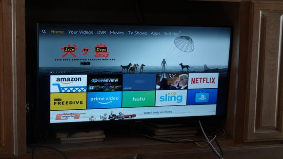 The home screen of the Amazon branded Fire TV Edition TVs. Notice a certain shopping channel atop the lineup, followed by another Amazon shopping channel?