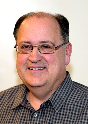 Nick Cafardo, former Boston Globe sports columnist, poses in this undated photo. Longtime Boston Globe baseball writer  has died after collapsing at the Red Sox's spring training ballpark. He was 62. The newspaper said Cafardo had an embolism Thursday, Feb. 21, 2019, and Red Sox medical staff was unable to revive him.