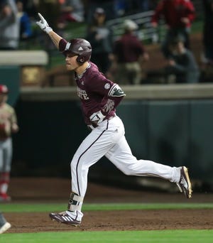 Mississippi State's Elijah MacNamee  celebrates after hitting a home run. Mississippi State opened the 2019 baseball season against Youngstown State on Friday, February 15, 2019. Photo by Keith Warren