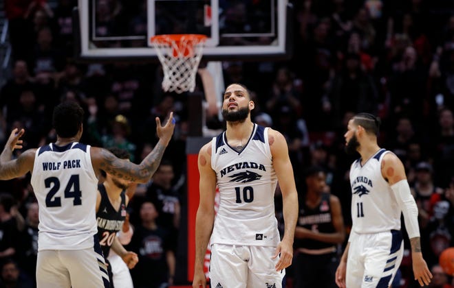 Caleb Martin, center, was the only Wolf Pack player to finish in double-figure scoring in Wednesday's loss at San Diego State.