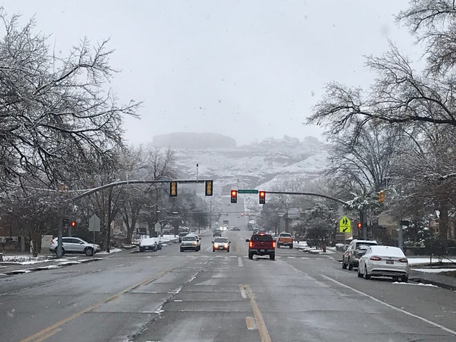 A rare blanket of snow covered the St. George area overnight, pushing local schools to open later than usual and slowing the Thursday morning commute.