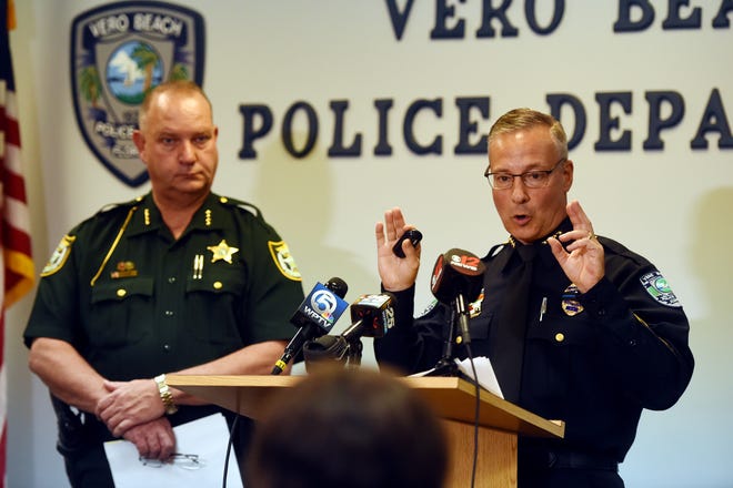 Vero Beach Police Chief David Currey (right), along with Indian River County Sheriff Deryl Loar, addresses the media at a press conference on Thursday, Feb. 21, 2019 about a multi-agency investigation into human trafficking and prostitution at massage parlors in Indian River County. From the three spas investigated by law enforcement, 171 arrest warrants have been issued in Indian River County and 45 have been arrested, according to Sheriff Loar.