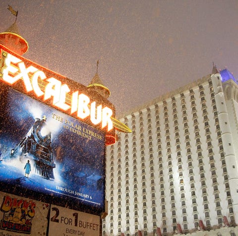 Snow falls outside the Excalibur Hotel & Casino...