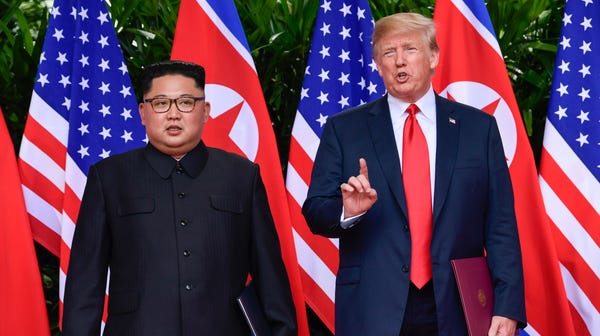 President Donald Trump and North Korea's Kim Jong...