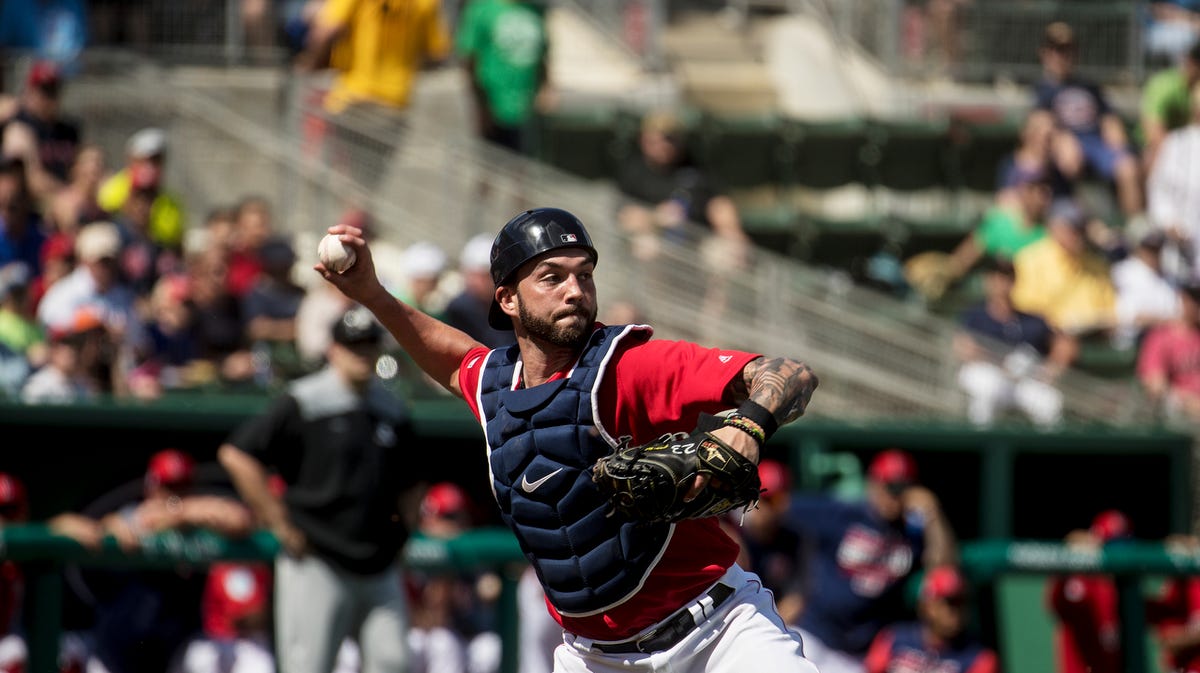 Boston Red Sox catcher Blake Swihart throws out a batter at first base during a spring training exhibition game between the Boston Red Sox and Northeastern University at JetBlue Park on Friday 2/22/2019. 