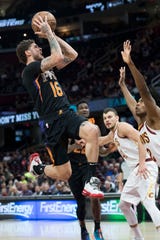 Feb 21, 2019; Cleveland, OH, USA; Phoenix Suns guard Tyler Johnson (16) drives to the basket against Cleveland Cavaliers guard Collin Sexton (2) during the first half at Quicken Loans Arena. Mandatory Credit: Ken Blaze-USA TODAY Sports