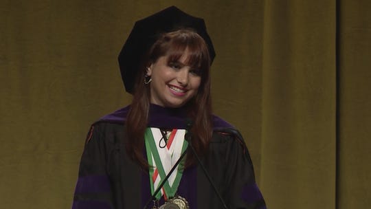 Haley Moss speaking at her law school's commencement ceremony at the University of Miami in 2018.