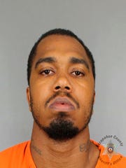This undated booking photo provided by the Arapahoe County Sheriff's Office shows Terance Black. Black and his mother, Tina Black, were sentenced to life without parole for the murder of a witness who cooperated with the police to investigate the robbery in 2016 of a marijuana store in Colorado. The secret murder case became public on Thursday, February 21, 2018 when Terance Black and Tina Black were sentenced to the Arapahoe County Court.