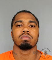 This undated booking photo provided by the Arapahoe County Sheriff's Office shows Terance Black. Black and his mother, Tina Black, were sentenced to life without parole for the murder of a witness who cooperated with the police to investigate the robbery in 2016 of a marijuana store in Colorado. The secret murder case became public on Thursday, February 21, 2018 when Terance Black and Tina Black were sentenced to the Arapahoe County Court.