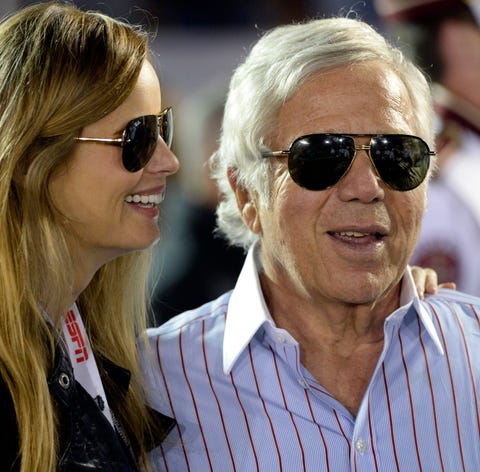 Kraft stands with his girlfriend Ricki Noel...