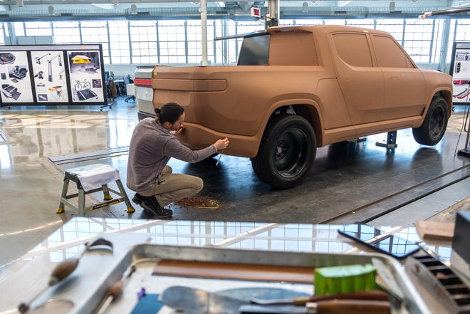 Rivian Lead Design Sculptor Andrew Frierott works on design development for an R1T electric vehicle at the startup in Plymouth on Thursday, February 21, 2019.