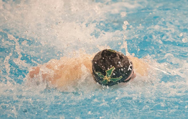 Holden Smith of St. Xavier  takes first in the boys 100 yard butterfly of the KHSAA state swimming and diving championships with a time of 49.11.22 February 2019