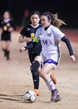 Mission Oak's Brianna Alvarez, right, battles with Golden West's Ymari Vasquez in a Central Section Division III championship soccer game on Friday, February 22, 2019. Alvarez scored to give the Hawks the 1-0 win.
