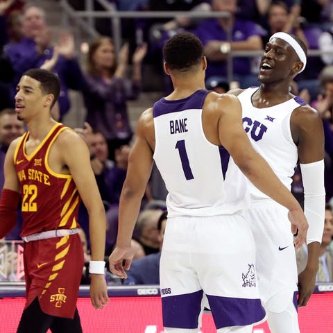TCU Horned Frogs forward Kouat Noi (12) and guard...