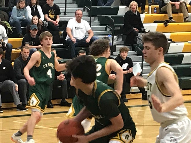 CMR's Brenden Lindseth, front, looks toward teammate Bryce Nelson for an outlet after grabbing a rebound Saturday against Billings West at the CMR Fieldhouse.