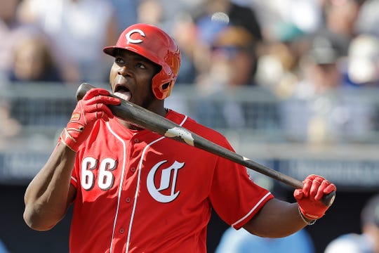 Yasiel Puig, of the Cincinnati Reds, is fighting in the third round of a spring training bout against the Seattle Mariners on Monday, February 25, 2019, in Peoria, Arizona.