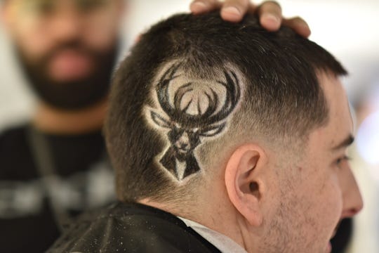 Bucks Employee Gets Logo Shaved Into Hair For Barbershop Mondays