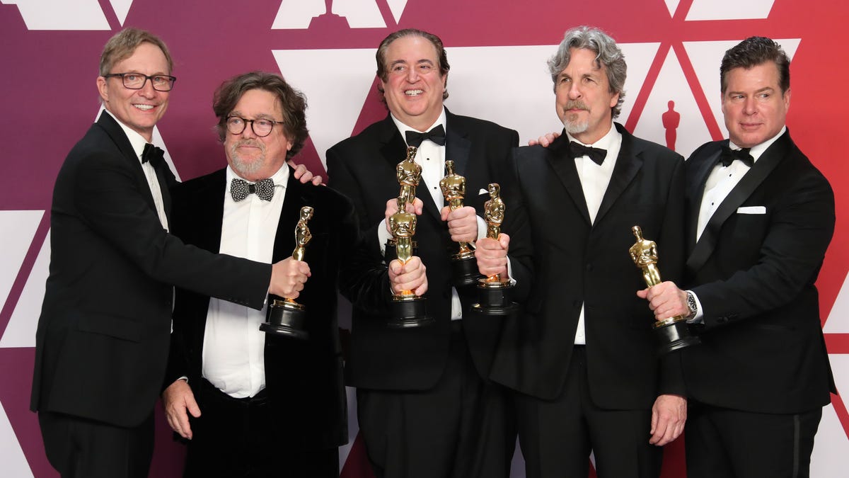 Jim Burke (far left), Charles B. Wessler, Nick Vallelonga, Peter Farrelly and Brian Hayes Currie pose with their best picture Oscars for "Green Book."