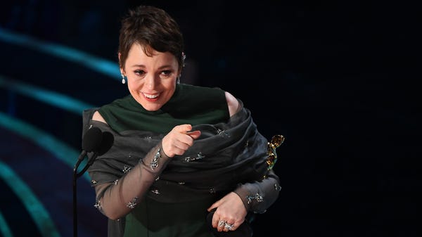 Olivia Colman accepts the award for best...