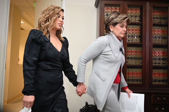 Lizzette Martinez, an accuser of R. Kelly, with her attorney Gloria Allred at a press conference in Allred's office in Los Angeles, Feb. 25, 2019.