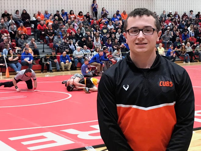 A serious knee injury could have ruined Sam Krupa's senior year of football and wrestling, but he and the tight-knit Lucas community would not let that happen.