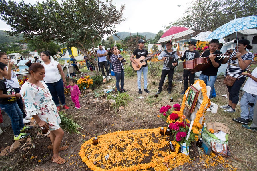 Chilapa has become one of the most violent cities in the world. Many young people have been the casualties of organized crime and ultimately end up in the municipal cemetery. On Day of the Dead, family member visit the grave of a young man who was murdered along with his cousin by cartel members.