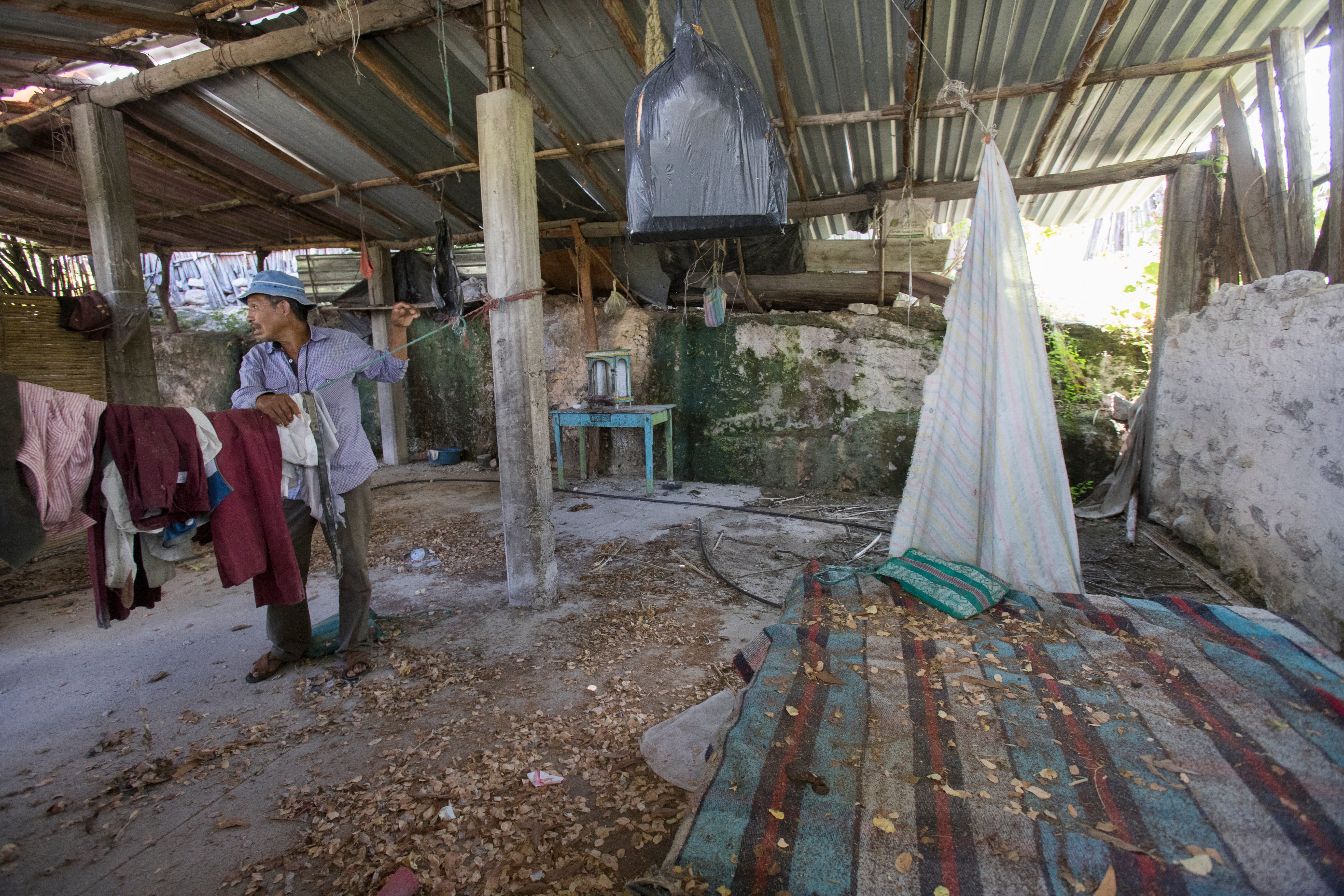 Salomon Lara Tlaltempa visits the home of his 24-year-old son, who was among six people killed by armed men on Jan. 6, 2016. 