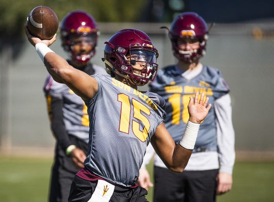 Dillon Sterling-Cole fires a pass during Tuesday's practice.