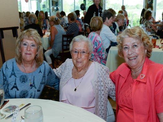 Judy Spellman, left, Alice Jordan and Brigette Picardi at the St. Lucie West Garden Club luncheon and fashion show.