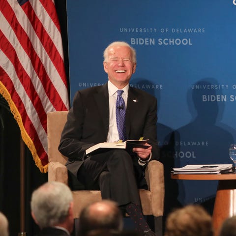 Joe Biden, left, and presidential historian Jon...