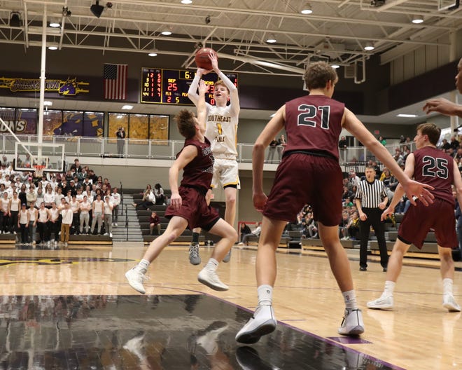 Southeast Polk's James Glenn (1) pulls up and shoots in the lane against Dowling Catholic during their game at Johnston High School in Johnston, Iowa, on Tuesday, Feb. 26, 2019. Dowling won the game 44-40 to advance to state.