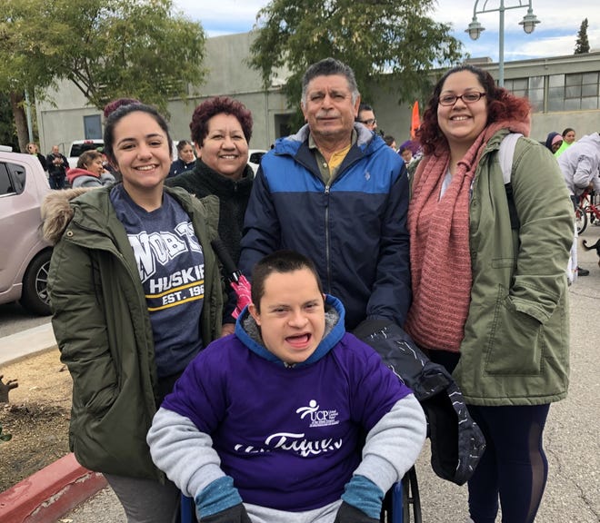 Participant Mateo Chávez (in front) and his support team: Mayra Chávez, Ramona Chávez and Felix Chavez, and Alana Horvatin – all came to raise money and awareness for United Cerebral Palsy of the Inland Empire.