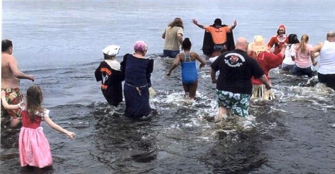 Seventeen participants were brave enough to participate in this year's Snowflake Plunge in Millville.