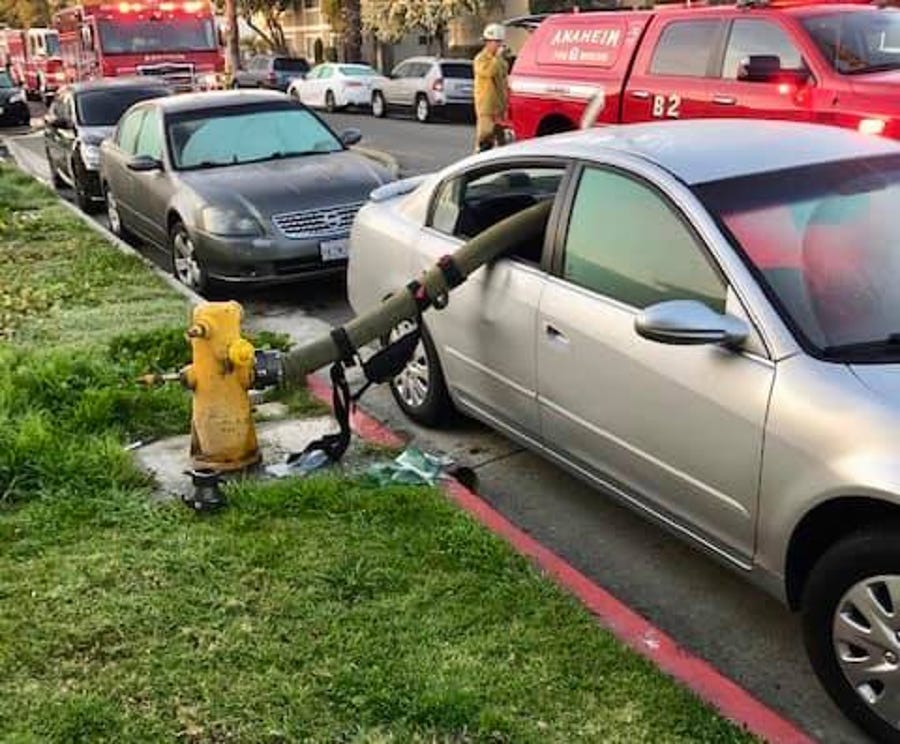 The Anaheim Fire & Rescue Department tweeted a warning to drivers on Feb. 26: a series of photos showing a fire hose strung through the back seat of a car that was parked next to a fire hydrant.