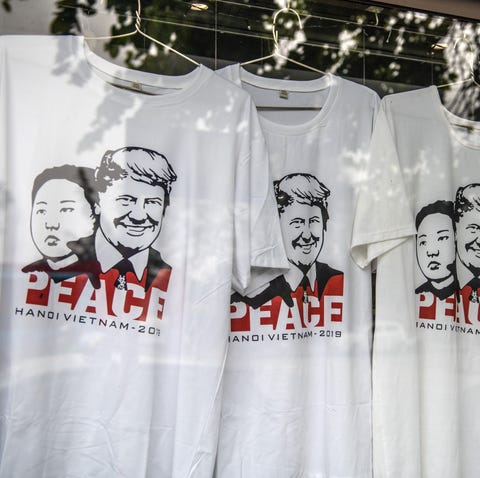 Hanoi summit souvenir T-shirts are displayed in a...
