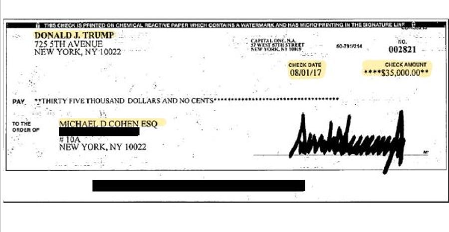 A copy of a check from President Donald Trump to his former attorney Michael Cohen. Cohen presented the check as evidence as part of his congressional testimony before the House Oversight Committee in Washington on Feb. 27, 2019.