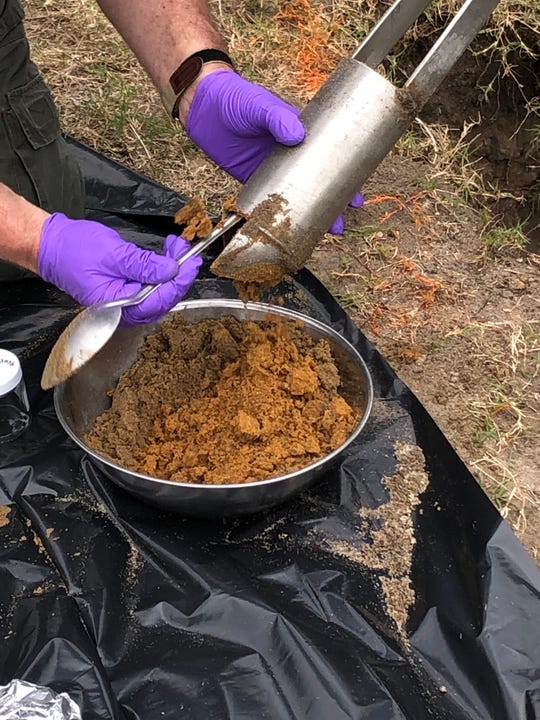 EPA and its contractors dug up soil samples this week to test for chemicals and metals in the yard of Sandra Sullivan, in South Patrick Shores, where residents near Patrick Air Force Base fear health risks from military waste buried in the area years ago.