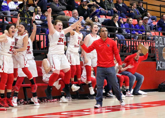The Loving Lady Falcons bench reacts to a last-second shot in the district tournament in 2019 which sent the team to the championship game. Loving will be making its second straight NMAA state basketball tournament appearance on Friday, heading to Penasco to face the No. 1 Lady Panthers.