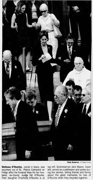 07/07/2001 Melissa O'Rourke, center in black, was escorted out of St. Patrick Cathedral on Friday after the funeral Mass for her husband, ex-County Judge Pat O'Rourke. Their daughter Charlotte O'Rourke is a top left. Businessman Jack Maxon, lower left, served as pallbearer and spoke during the service, telling friends and family about the good memories he has of O'Rourke, when they bicycled together.