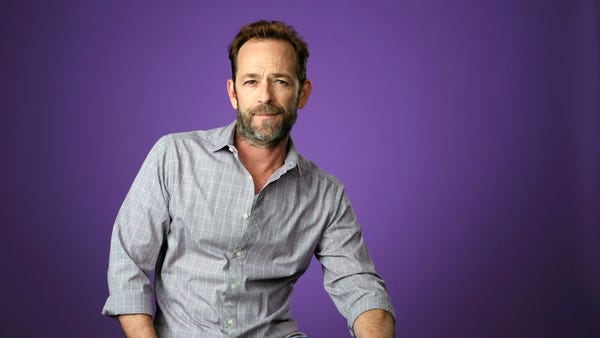 In this Aug. 6, 2018, file photo, Luke Perry, a...
