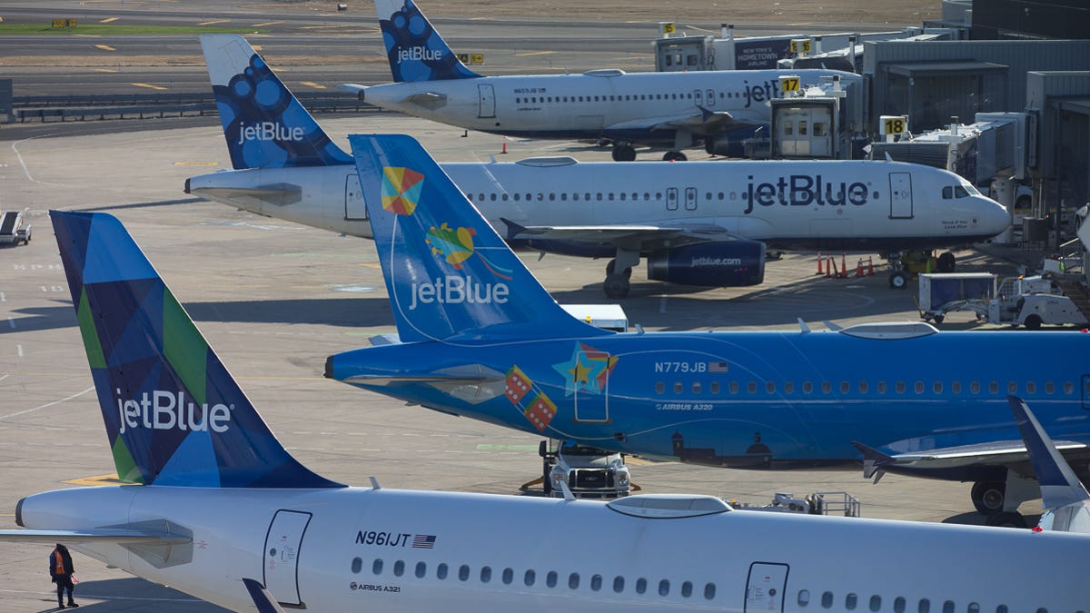 JetBlue Airbus jets line Terminal 5 at New York John F Kennedy International Airport on Feb. 17, 2019.