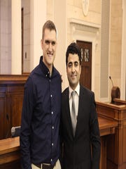 Former Iowa National Guard Sgt. Dalton Jacobus, left, helped Afghan interpreter Nabi Mohammadi gain a visa to move to the United States. Jacobus was one of several Iowa soldiers who attended Mohammadi's citizenship ceremony at the federal courthouse in Des Moines on March 1, 2019.
